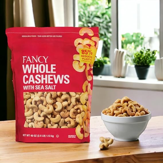 Kirkland Fancy Whole Cashews with Sea Salt Lightly Salted, Crunchy, Buttery Texture 2.5 lbs (40 oz) Resealable Bag Kosher, Whole Nut Snack